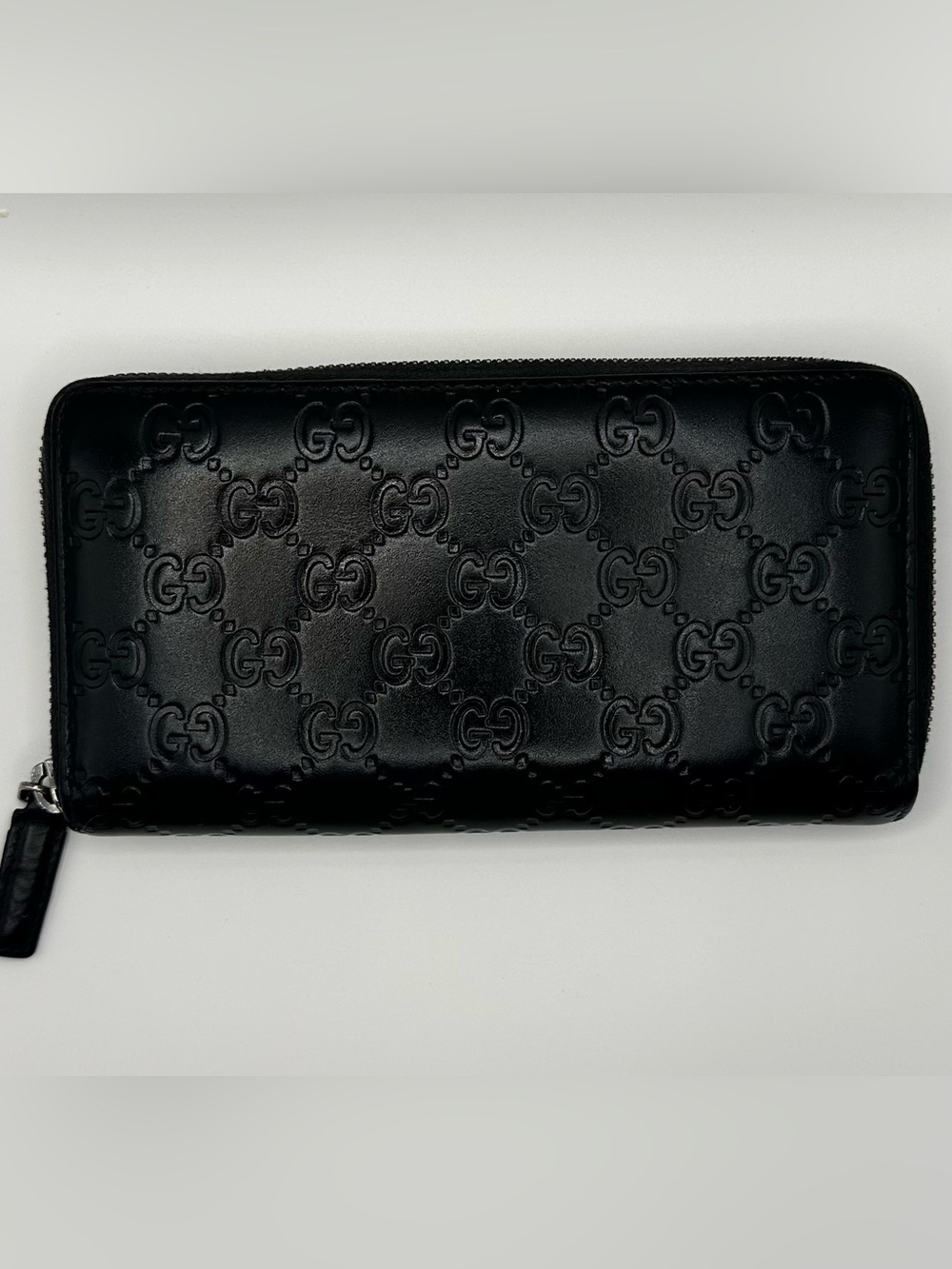 Gucci Black Embossed GG Zip Wallet. Brand New!